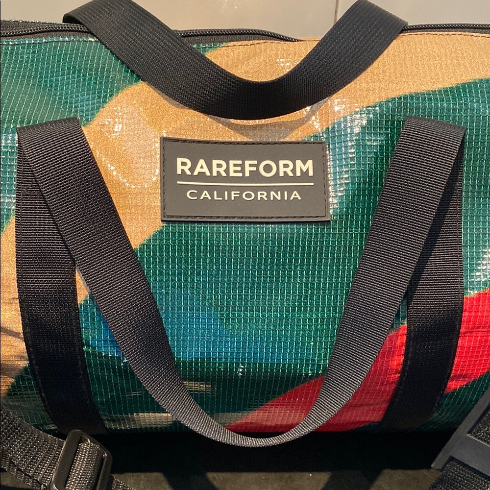 RAREFORM Duffel Bag with Shoulder Strap and Zipper Closing.
